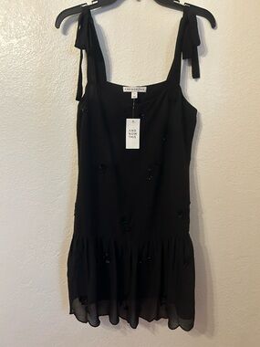 And Now This Black Tie-Shoulder Ruffle Mini Dress
